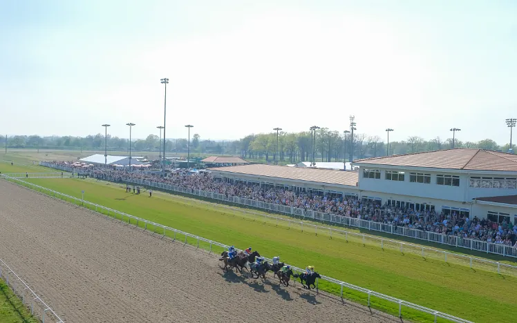 Full crowds watching the racing at Chelmsford City Racecourse.
