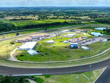 A birds eye view of the Chelmsford City Racecourse track and buildings.