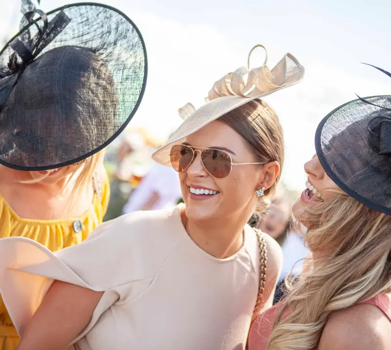 Three ladies dressed up for Ladies Day at Chelmsford.